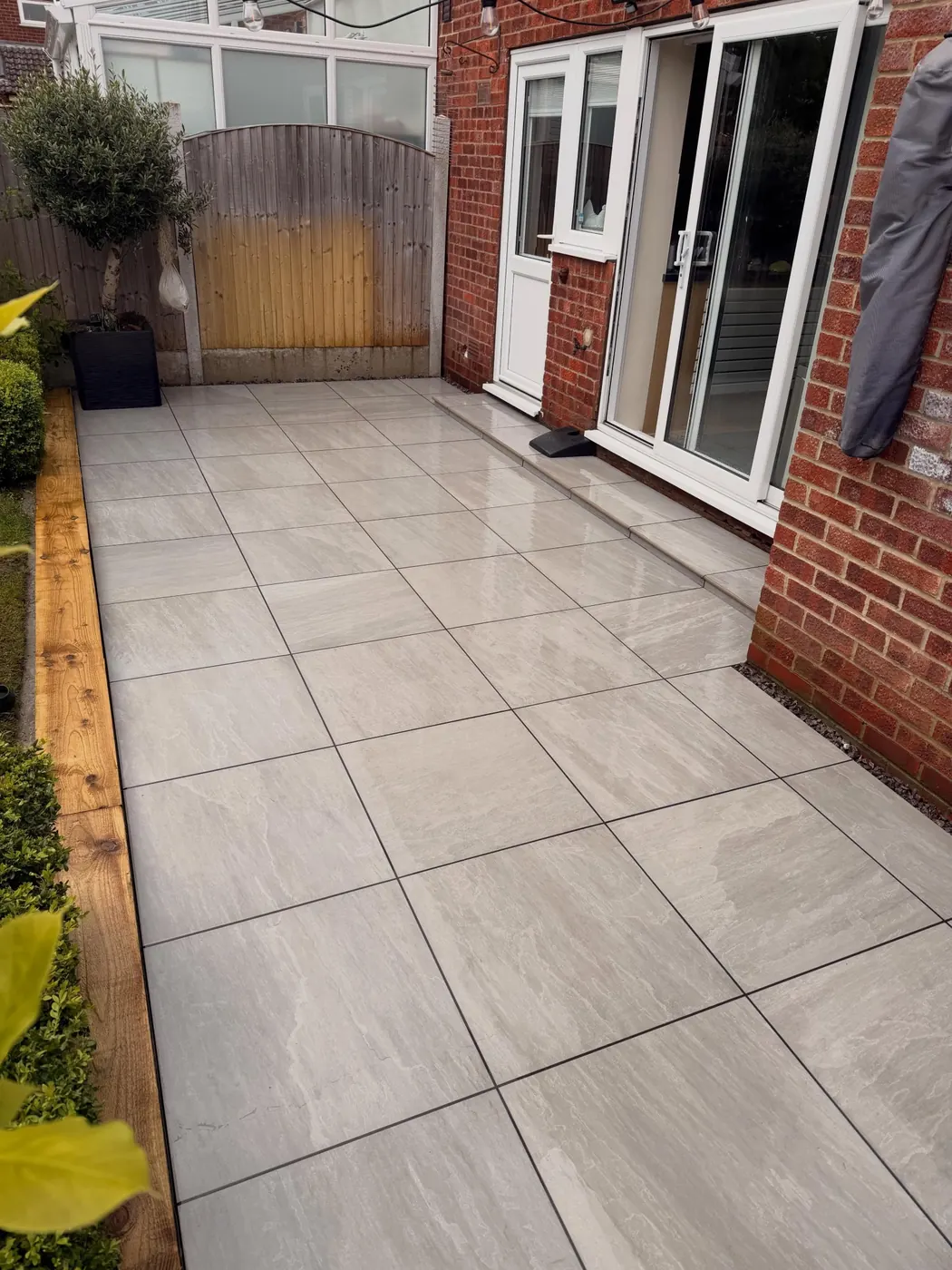 Grey porcelain patio after